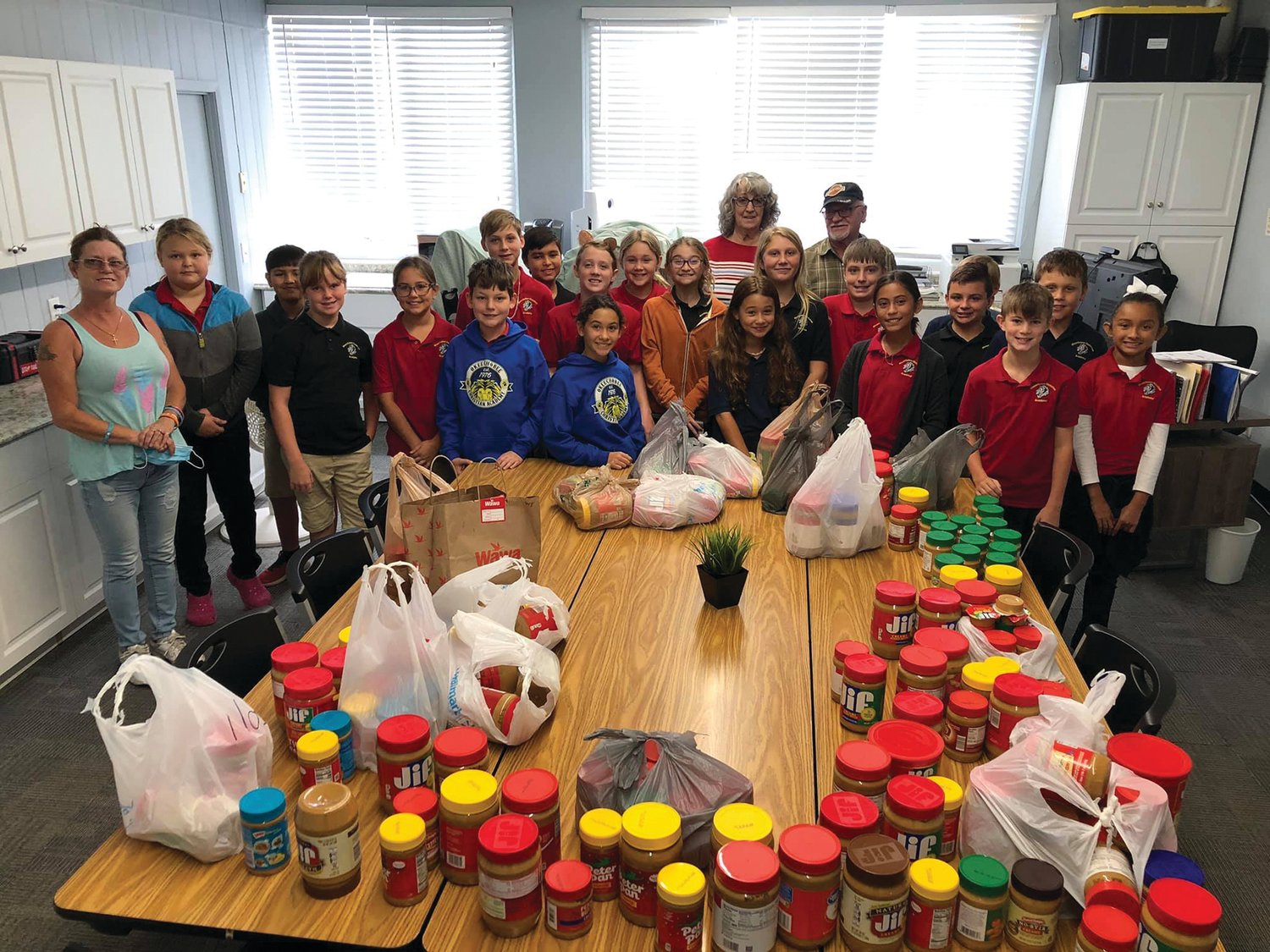 OCA students joined in with 4H to collect peanut butter. They donated it to Big Lake Missions.
